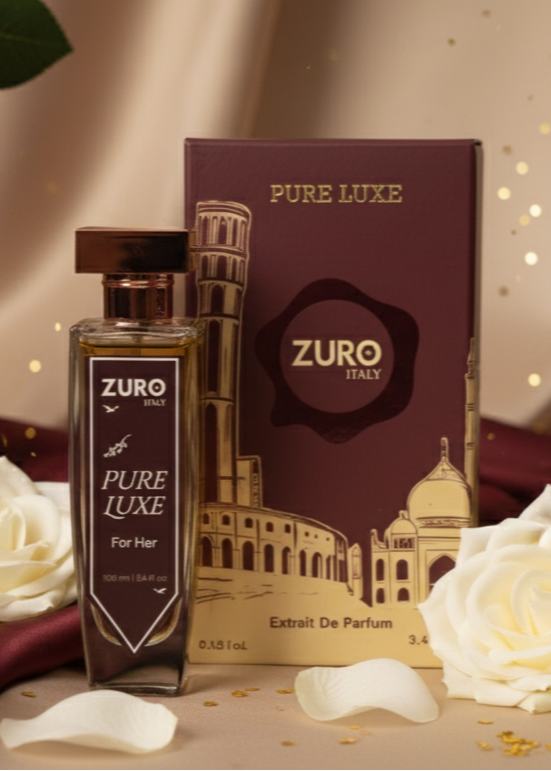 Zuro Pure Luxe perfume bottle and packaging with white roses on a decorative background